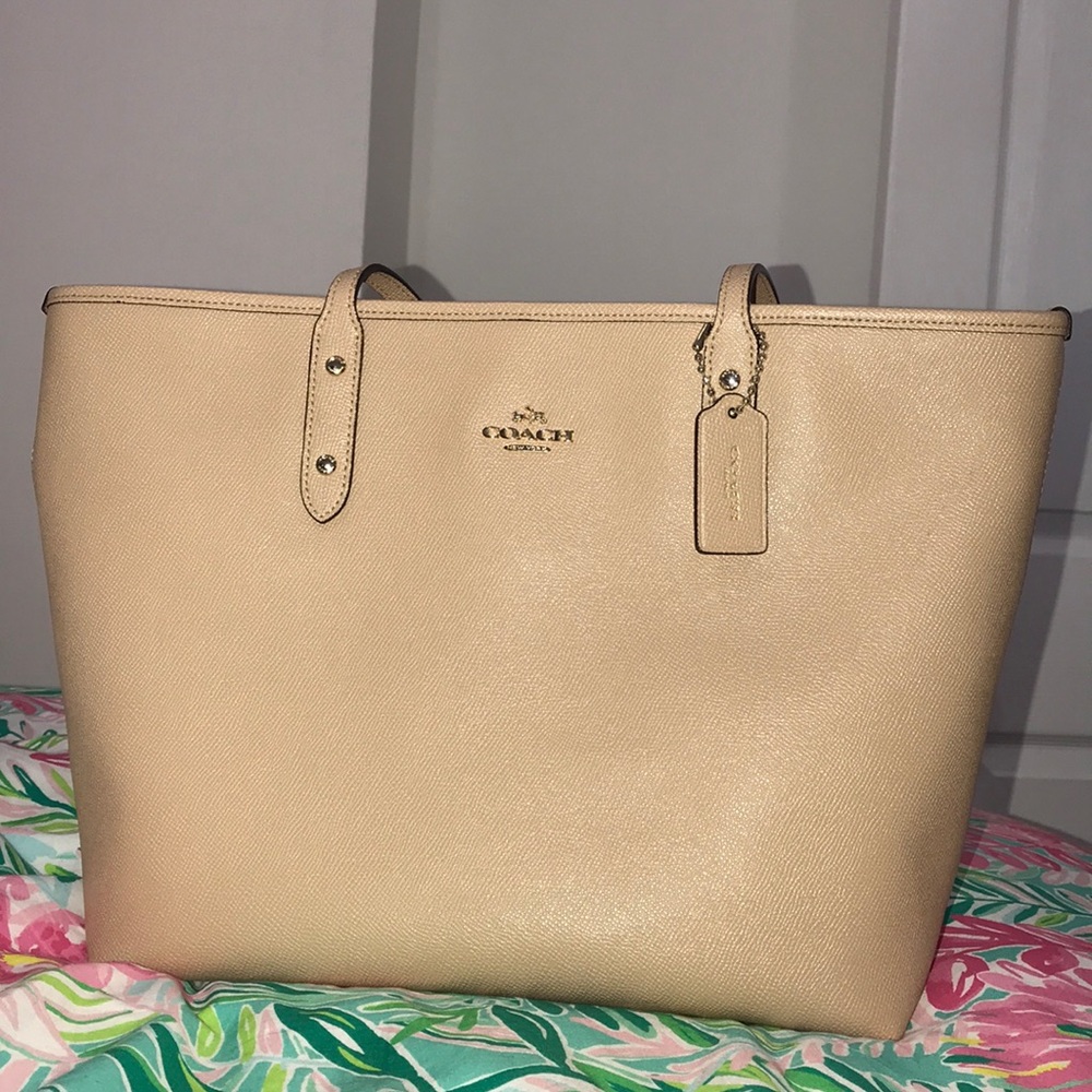Slightly used Nude Coach Purse!